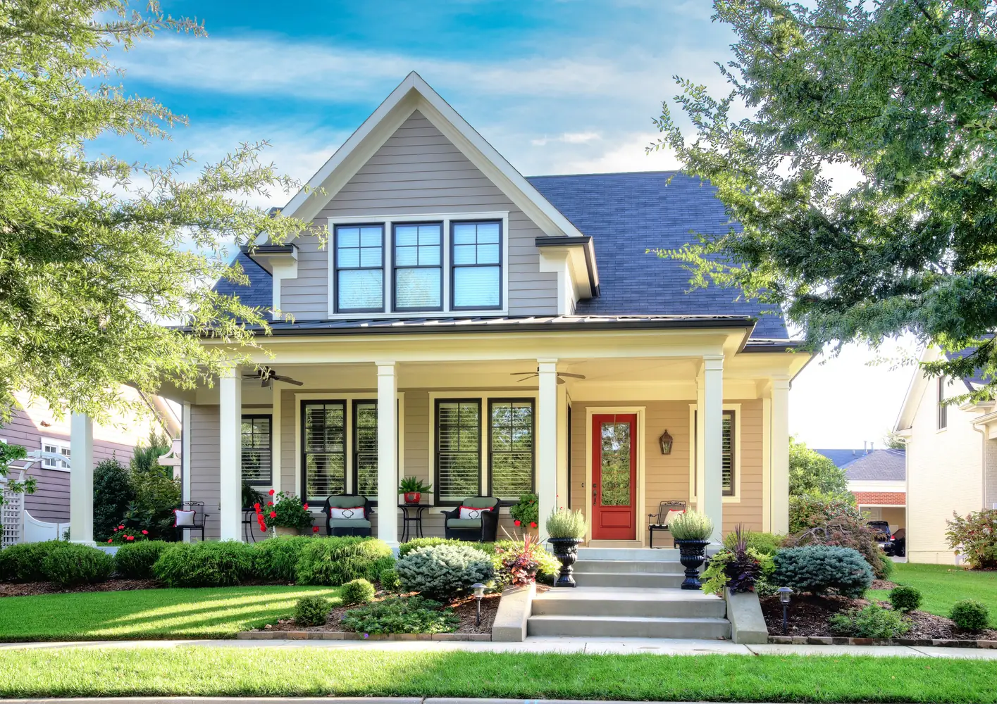 Craftsman-style home with Khaki Brown James Hardie siding and blue gable accents